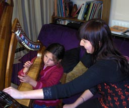 Ramona teaching harp