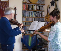 Ramona teaching fiddle